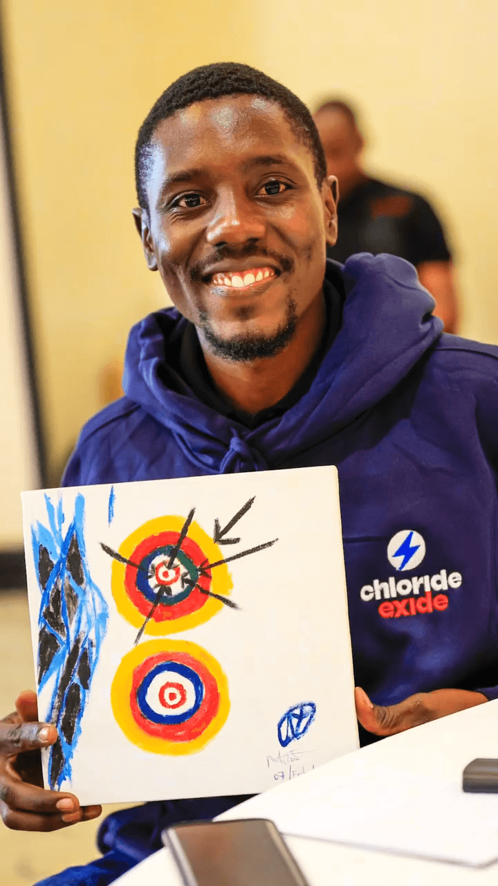 Participant with painting March 2026