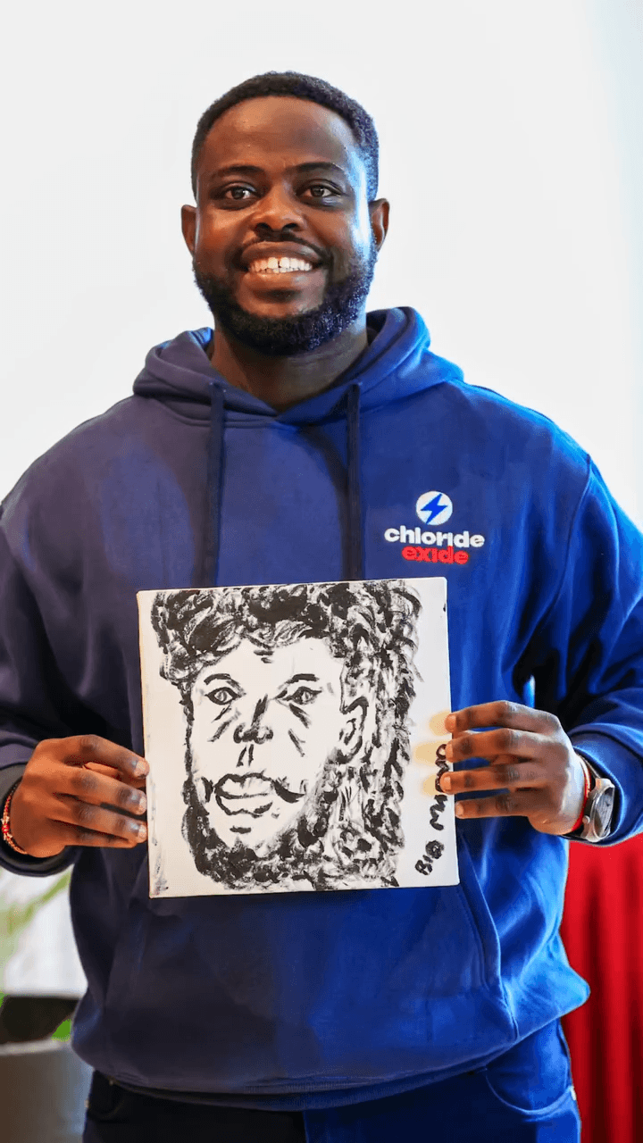 Participant with painting March 2026
