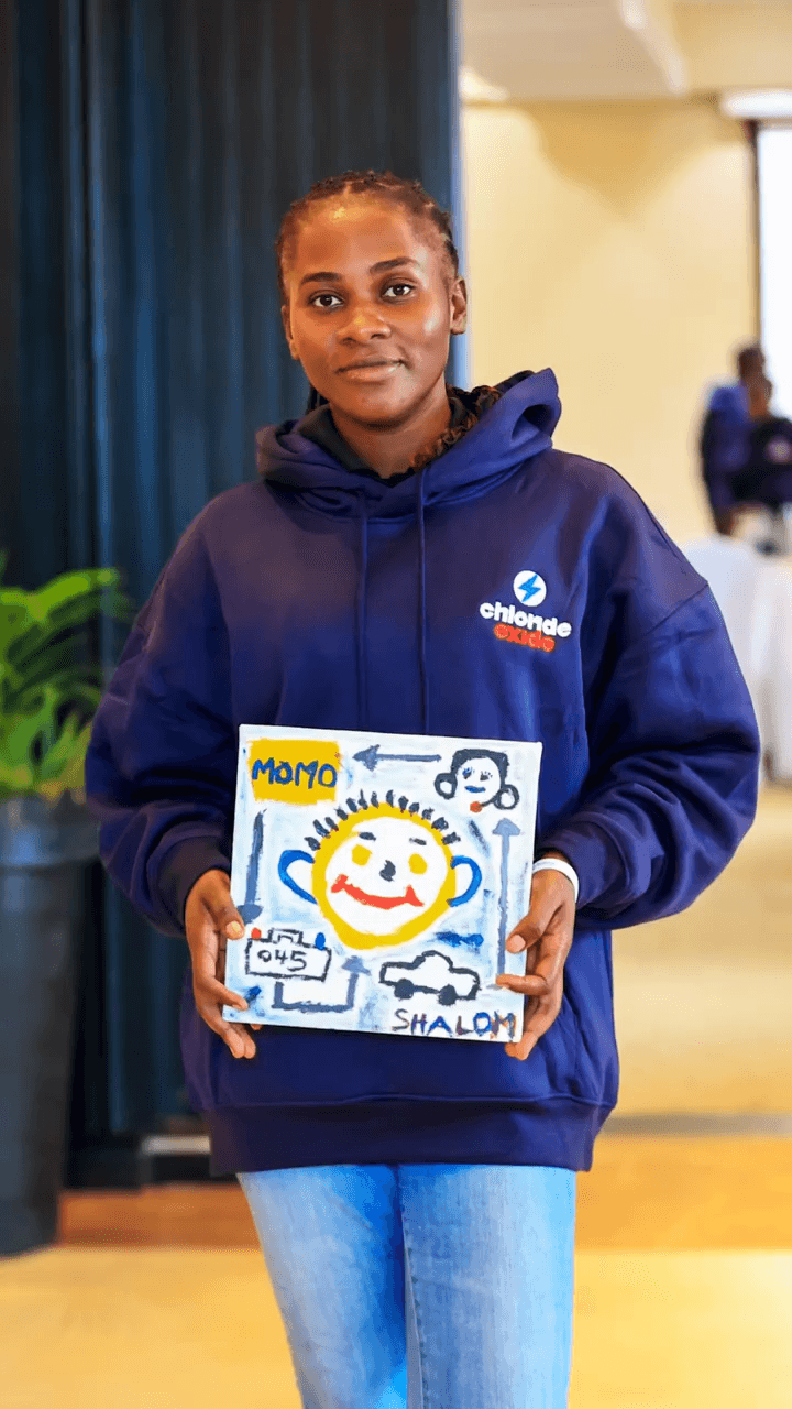 Participant with painting March 2026