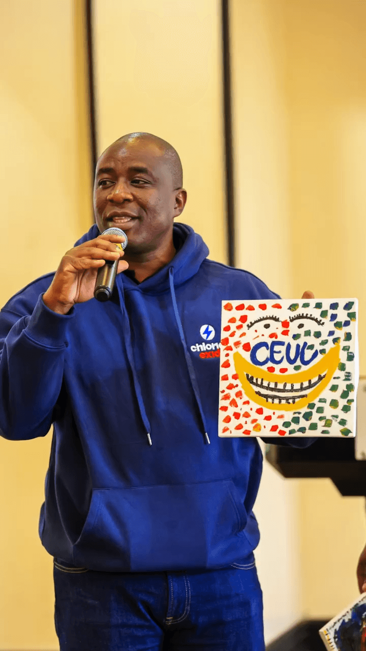 Participant with painting March 2026