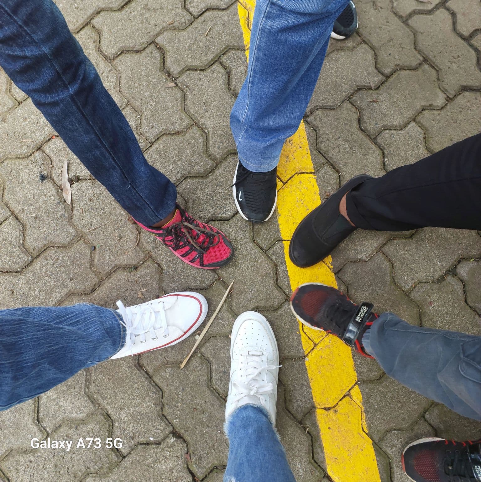 Teens workshop session, participants standing in a circle